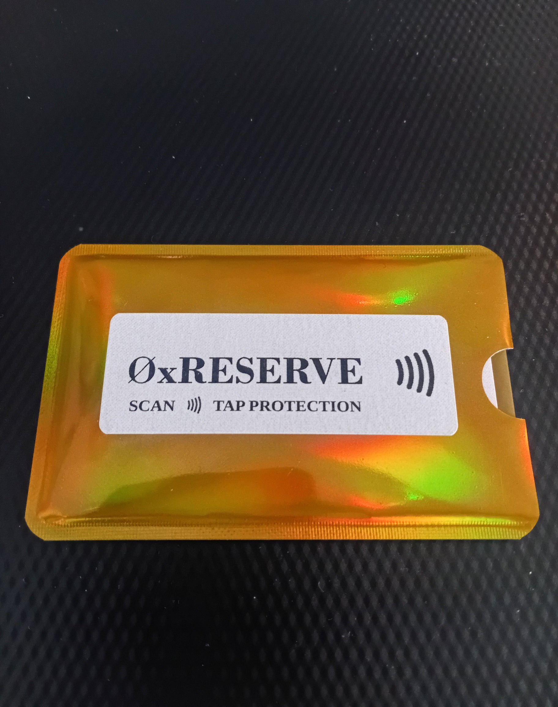 Holographic protective case with 'OxReserve' branding
