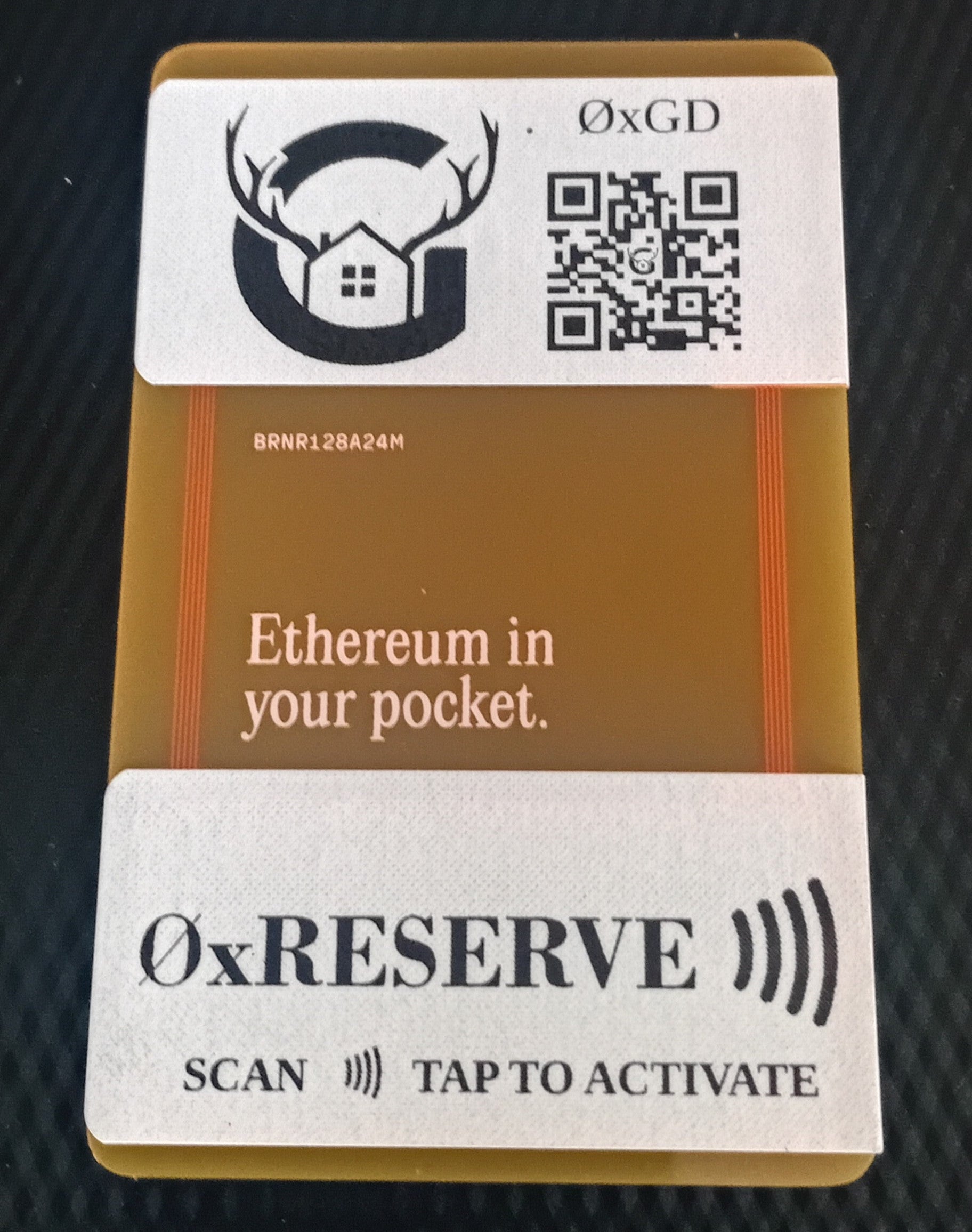 Card with QR code and text 'Ethereum in your pocket' on a textured black background